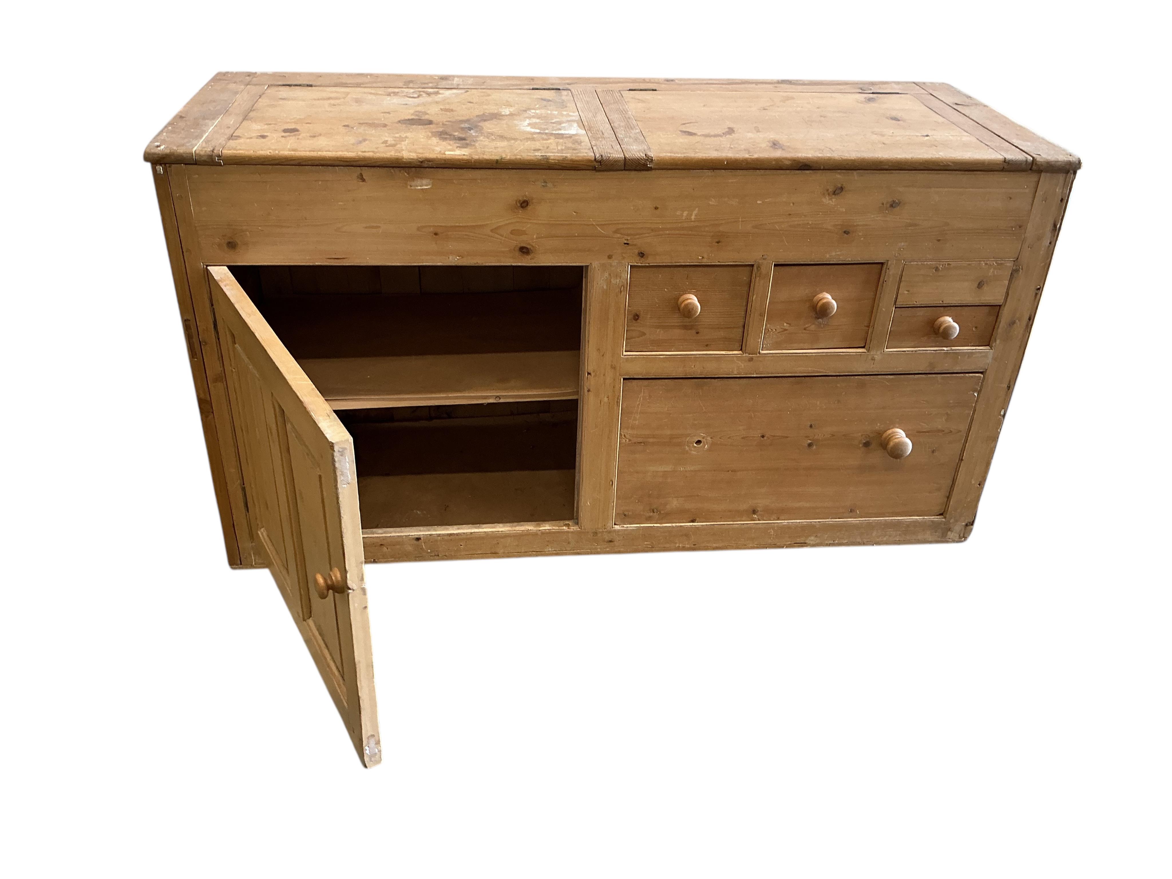 A Victorian pine low dresser with twin hinged compartment top, width 150cm, depth 53cm, height 80cm